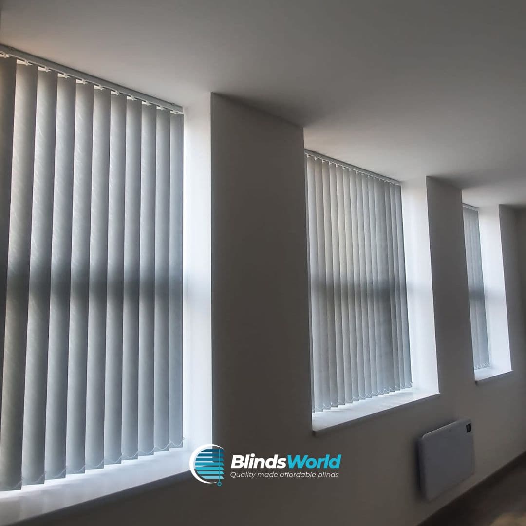 Window blinds expertly fitted across a full lounge