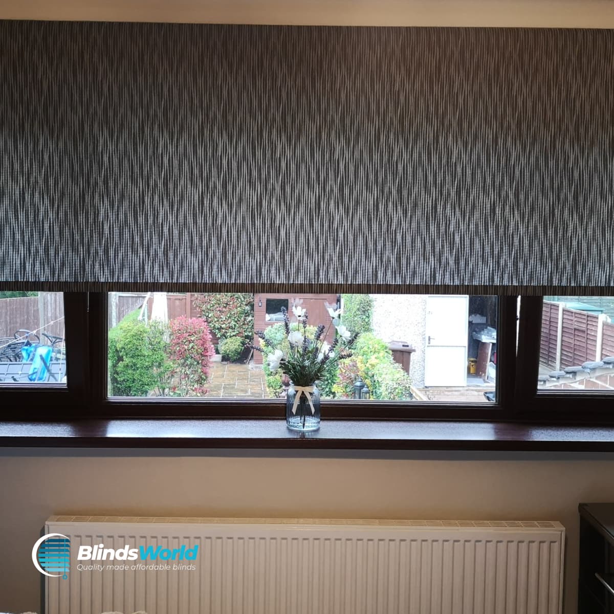 Roller blinds in a contemporary bedroom